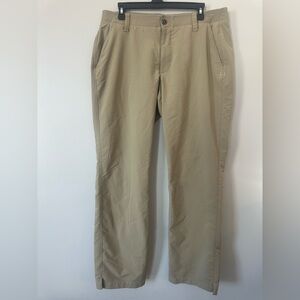 Under Armour Men’s flat-front golf pants in a beige/khaki color.  Size 36 X 32